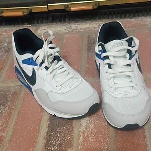 Nike Men's White and Black Sneakers with Blue Accents